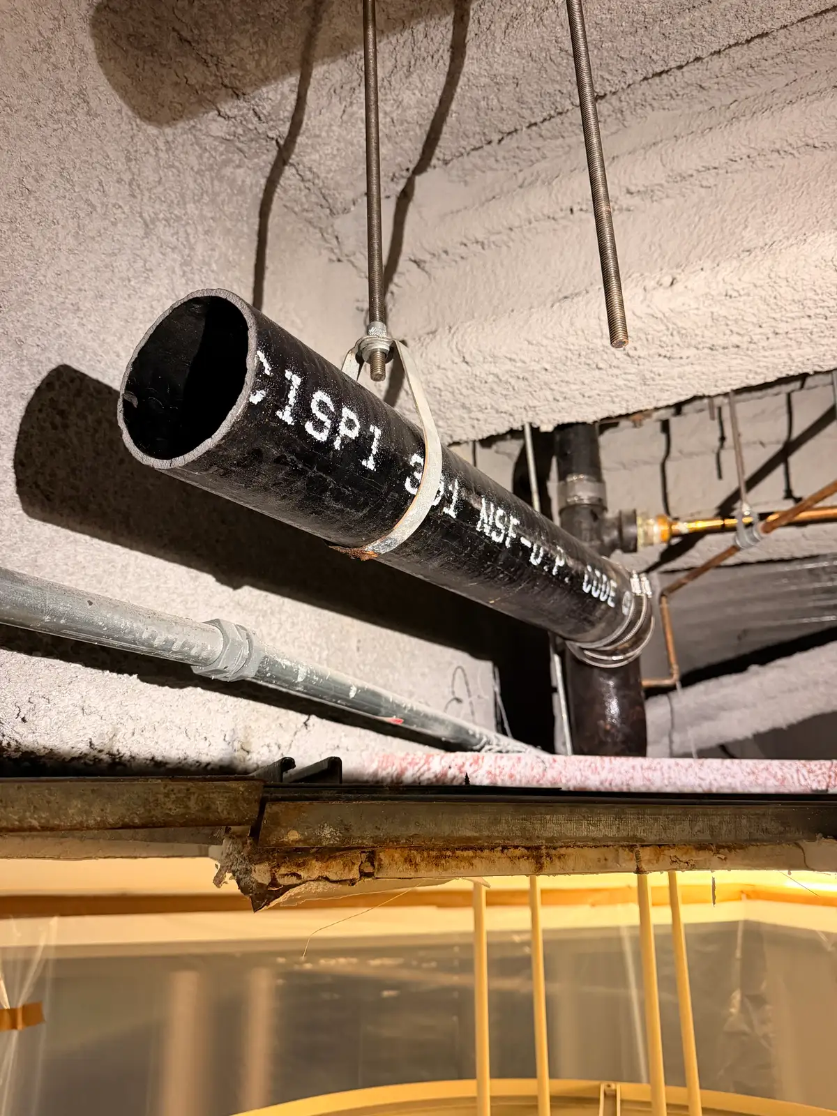 Corroded cast iron drain line removed during a South Bay replacement