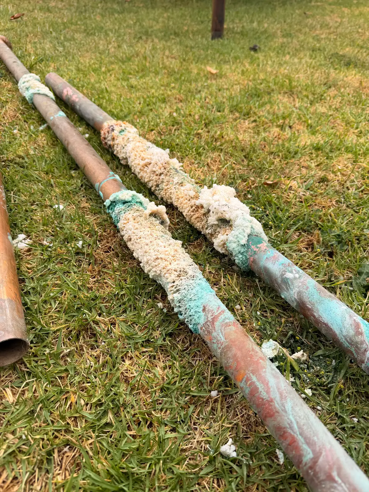 Corroded copper water line in a South Bay crawlspace