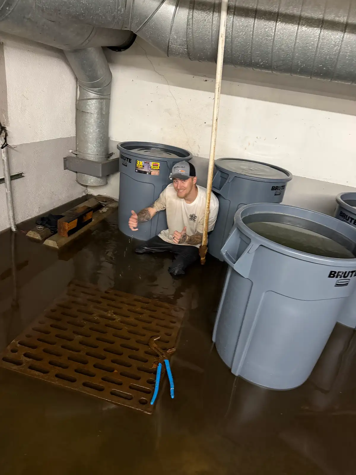 Sump pump serviced in a below-grade pit
